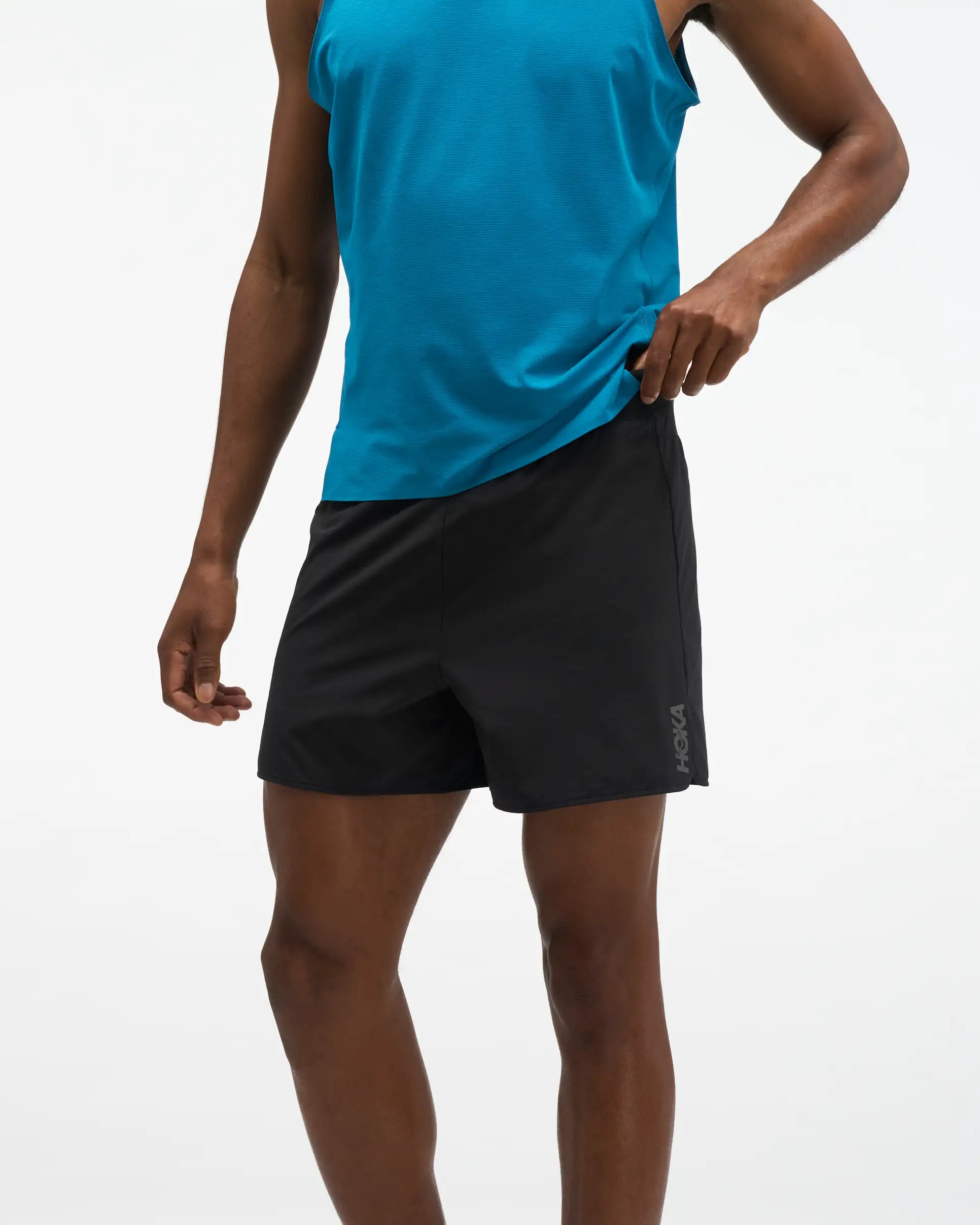 hoka glide 5 short with brief, lightweight shorts with under wear lining, black shorts, man wearing shorts with blue shirt