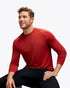 Man wearing hoka long sleeve run top in rusty red colour