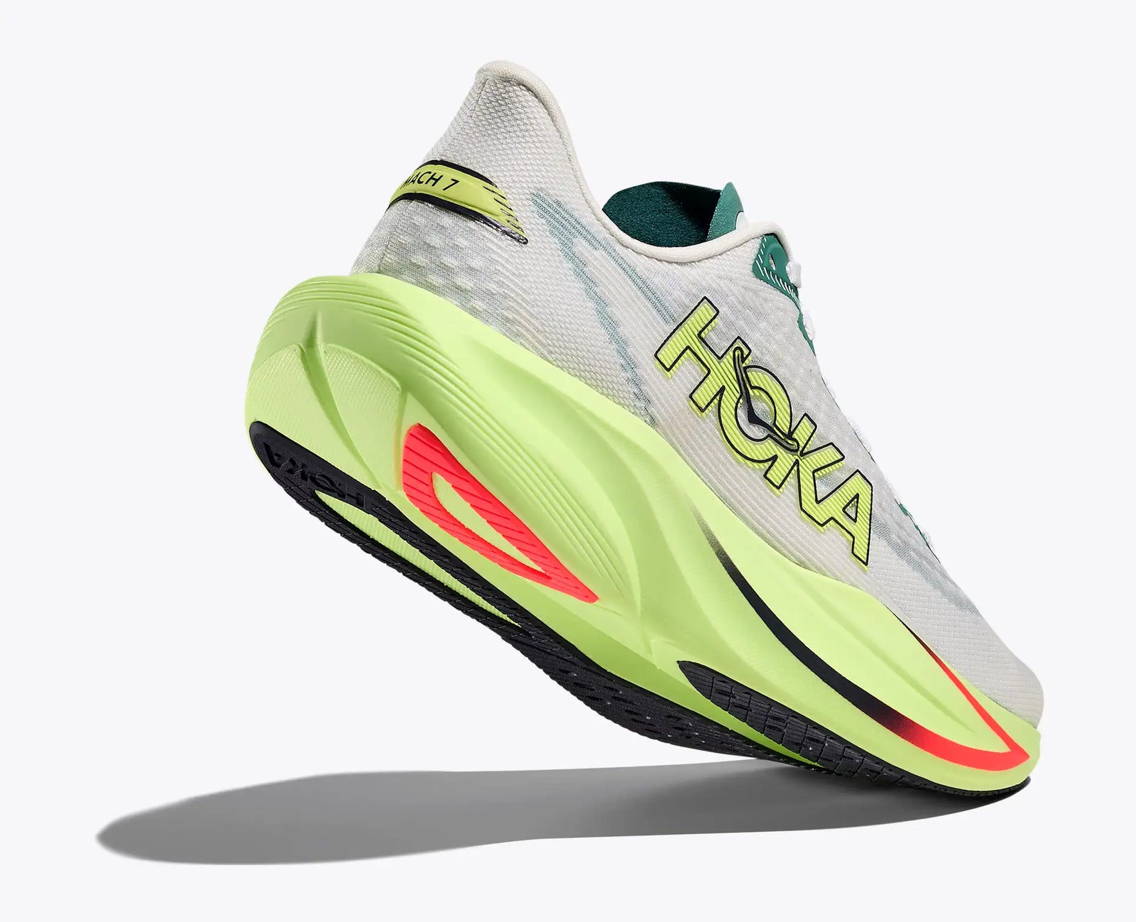 hoka mach 7 road running shoe for men, light and fast runner for every day running, grey with lime yellow details, side profile of shoe titled downwards on a white background