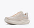 hoka mach 7, fast lightweight everyday running shoe with cushioning, light beige and white with peach laces and logo and rainbow detail, inside profile of shoe