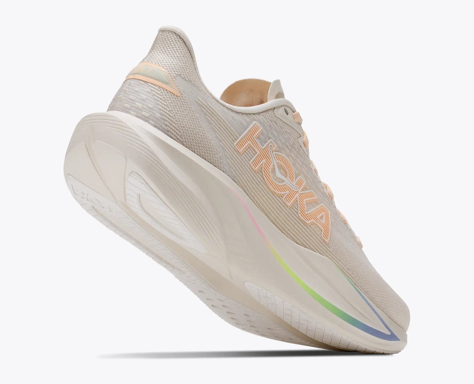 hoka mach 7, fast lightweight everyday running shoe with cushioning, light beige and white with peach laces and logo and rainbow detail, heel of shoe lifted showing sole
