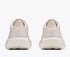 hoka mach 7, fast lightweight everyday running shoe with cushioning, light beige and white with peach laces and logo and rainbow detail, heels of shoes