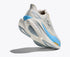 hoka mach x 3 for women, pebax plated speed and tempo running shoe, white with blue details, shoe with lifted heel showing sole 