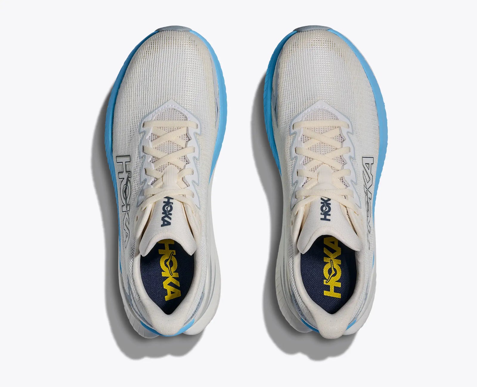 hoka mach x 3 for women, pebax plated speed and tempo running shoe, white with blue details, top of pair of shoes