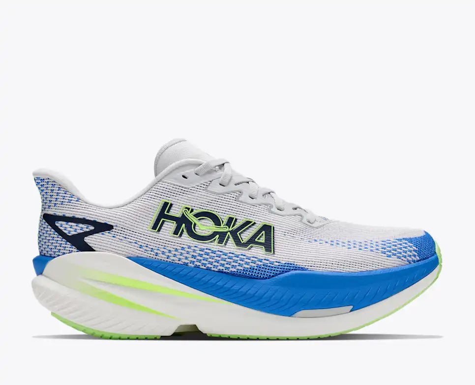 side view of mens mach x 3 road running shoe in a white colour with blue and green accents 