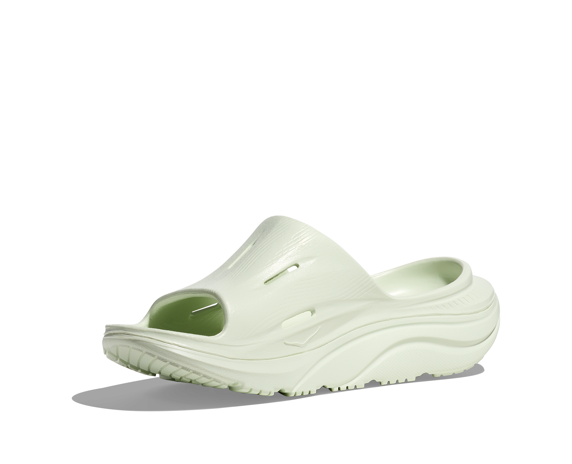 hoka ora recovery slide for all gender, comfortable and supportive slider for after run recovery, light green colour, side profile of ora slide on a white background