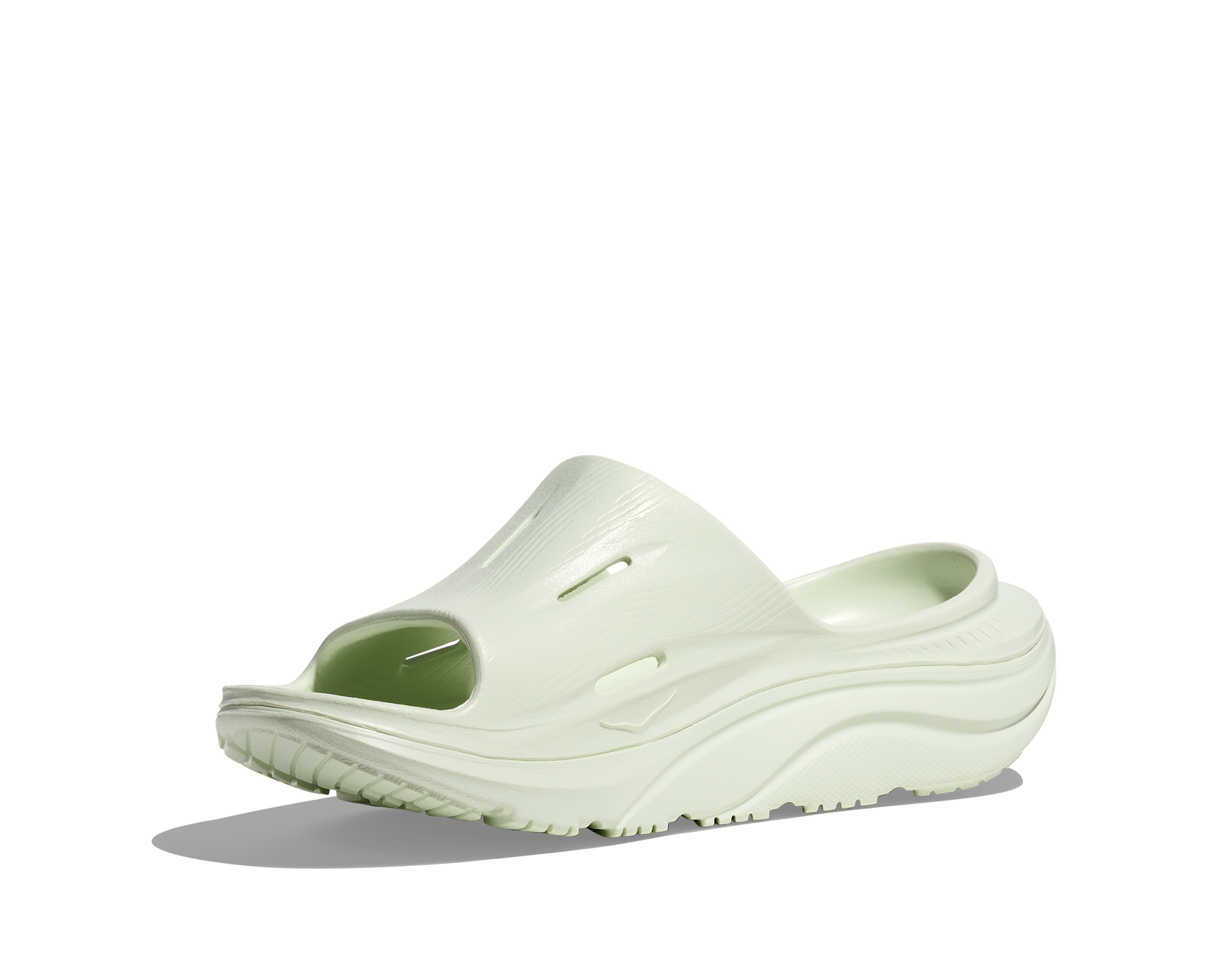 hoka ora recovery slide for all gender, comfortable and supportive slider for after run recovery, light green colour, side profile of ora slide on a white background