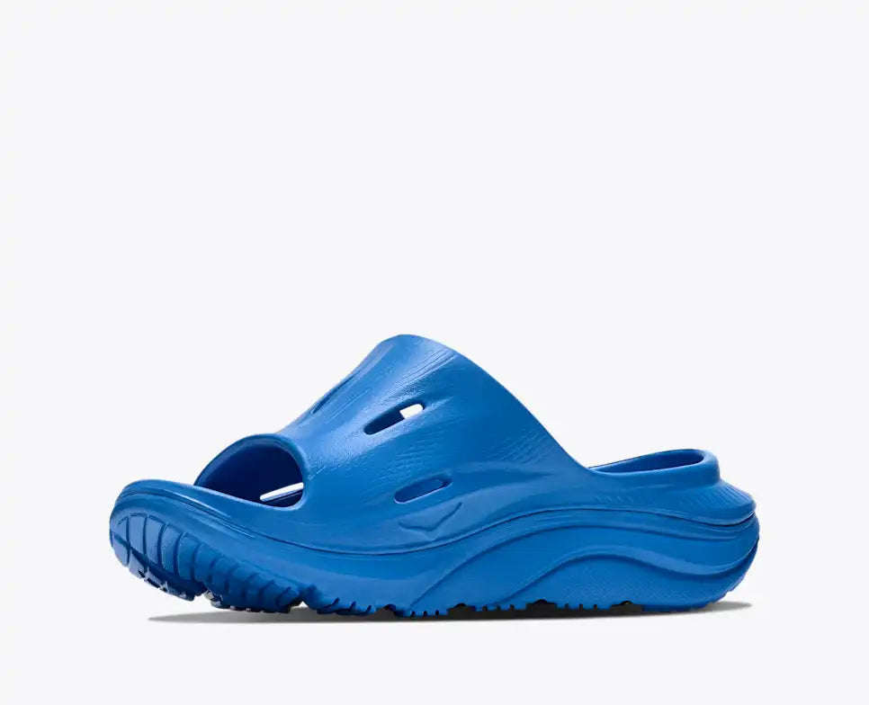 hoka ora recovery slide for all gender, comfortable and supportive slider for after run recovery, dark blue colour, side profile of ora slide on a white background
