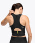 hoka race day bra, black crop top for warm weather running, up lose of back of bra with yellow stripe detail