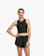 hoka race day bra, black crop top for warm weather running, woman wearing hoka sports bra top with black shorts