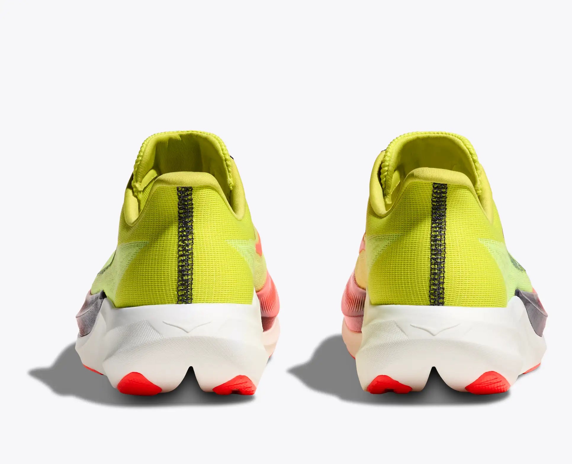 back of a pair of hoka rocket x3 running shoes in colour neon yuzu / squid ink