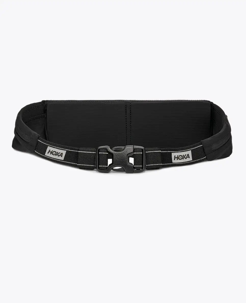 hoka running belt, running belt with zipper storage pockets, black colour with reflective logo, back of belt bag with clip closure