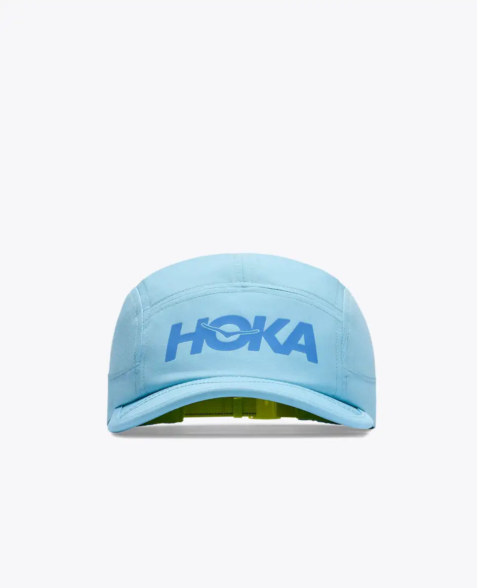 hoka running cap for all gender, lightweight breathable running cap, light blue and darker blue logo, front of hat