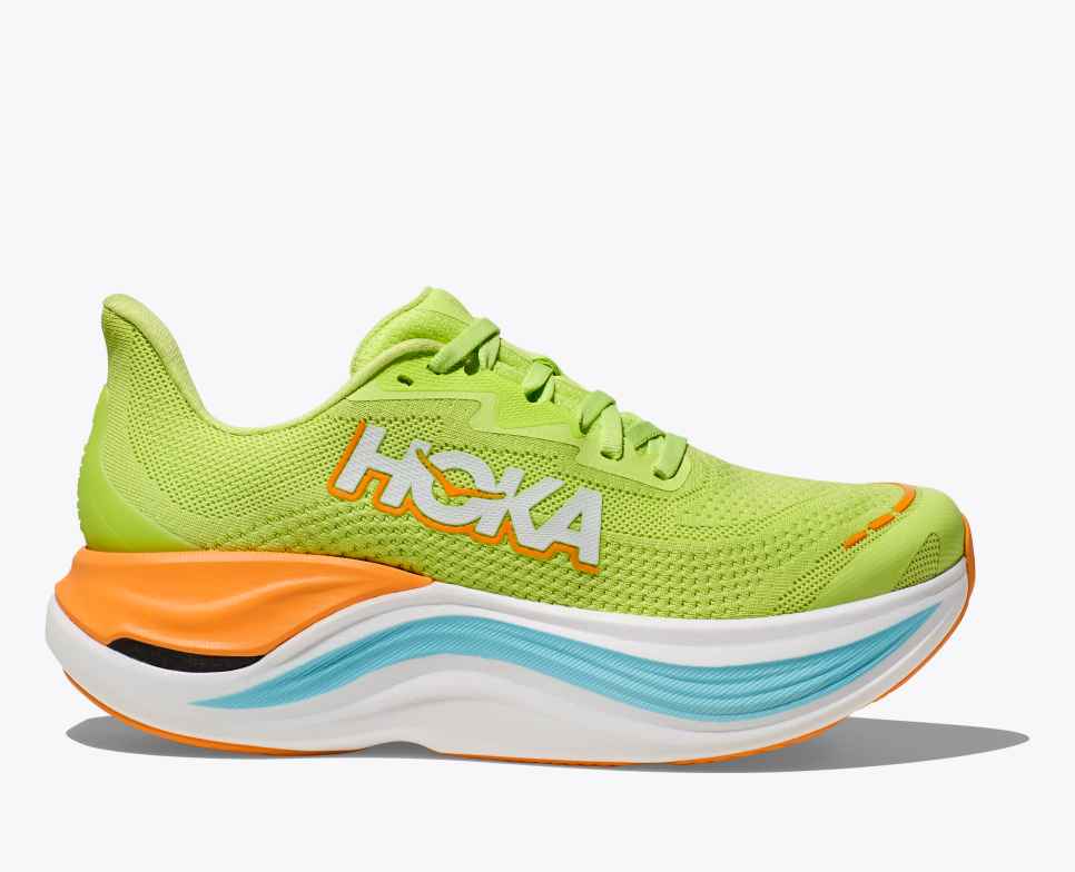 Green hoka skyward x running shoe with orange white and blue sole