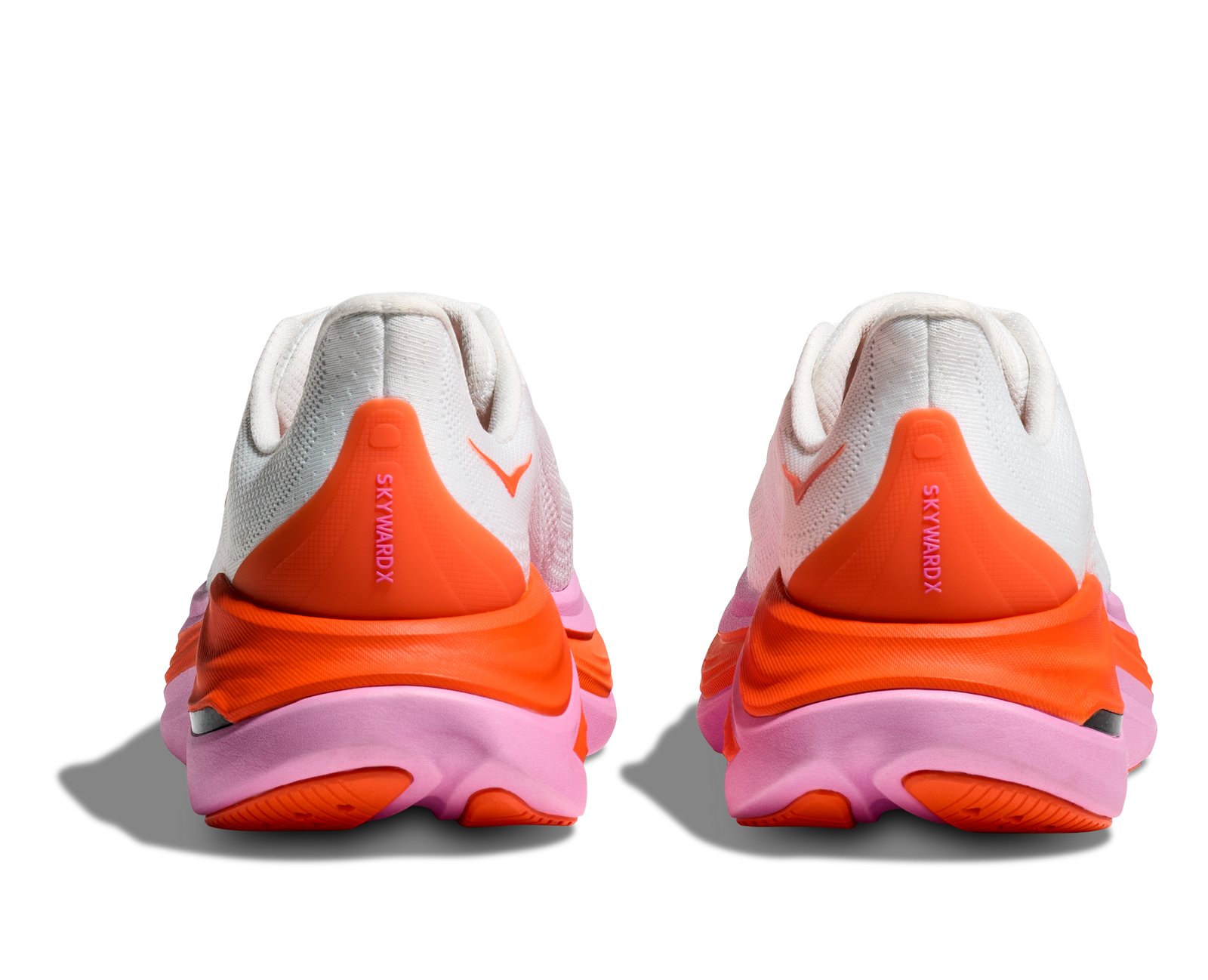 Hoka skyward x for women, super cushioned carbon plated running shoe, white colour with orange and pink details, heel of shoe