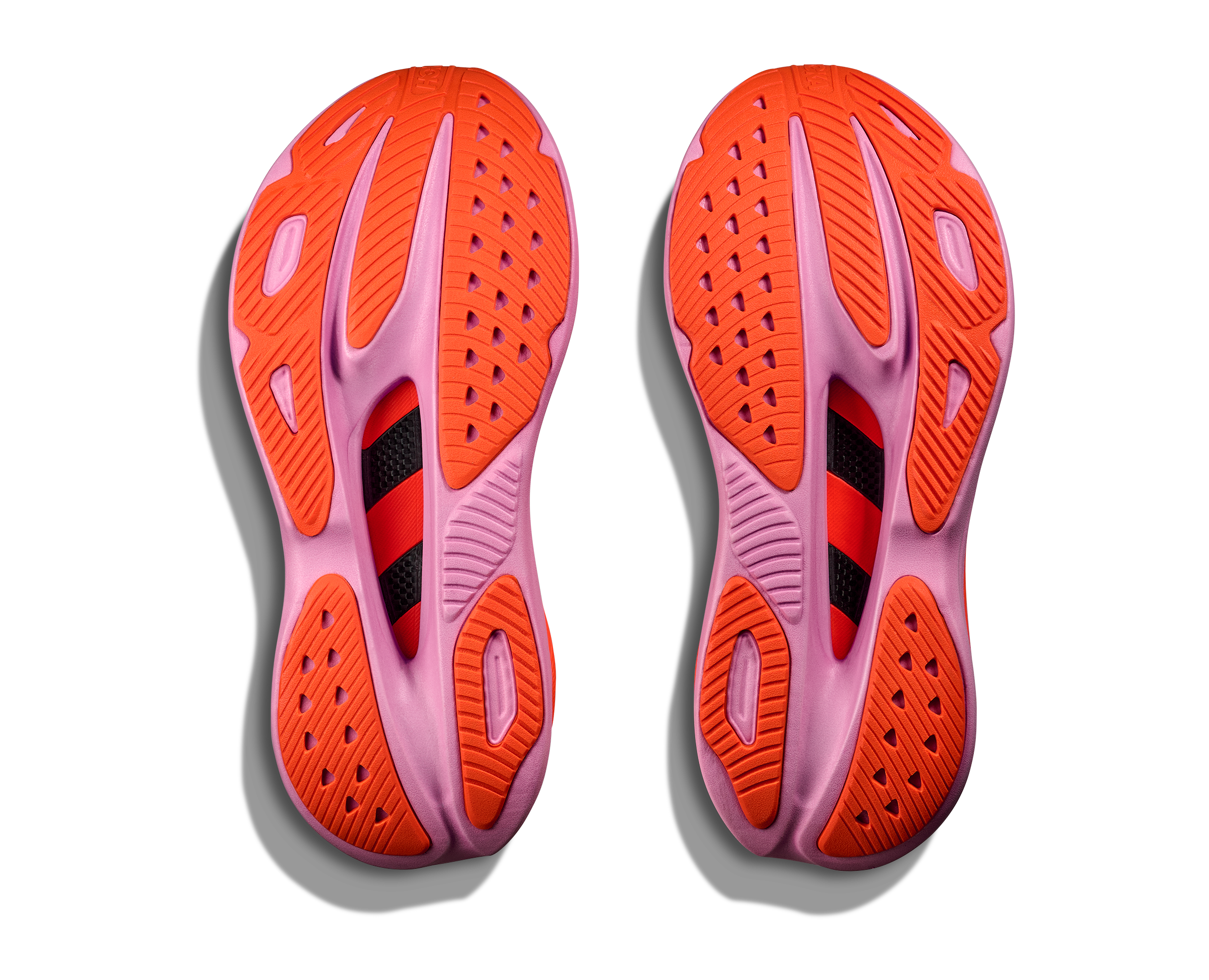 Hoka skyward x for women, super cushioned carbon plated running shoe, white colour with orange and pink details, sole of shoe 