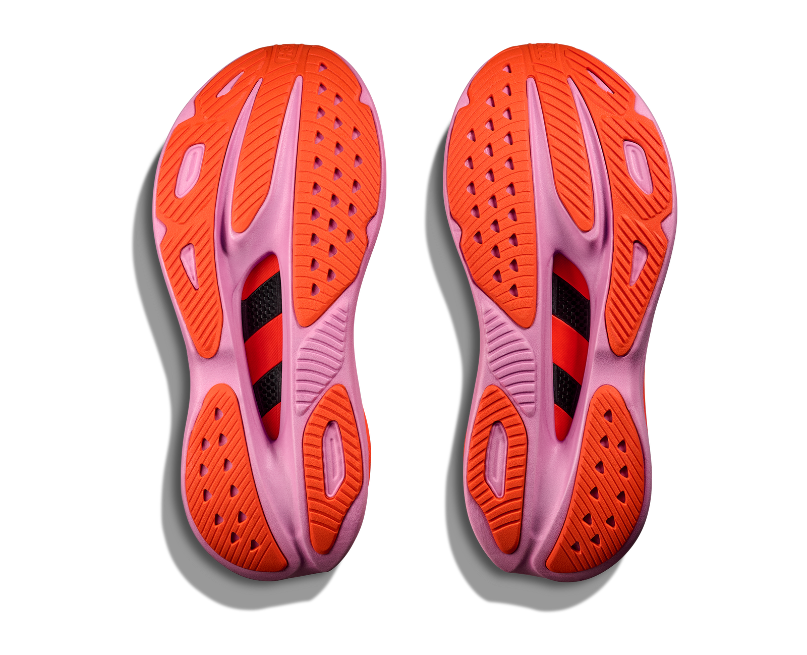 Hoka skyward x for women, super cushioned carbon plated running shoe, white colour with orange and pink details, sole of shoe 
