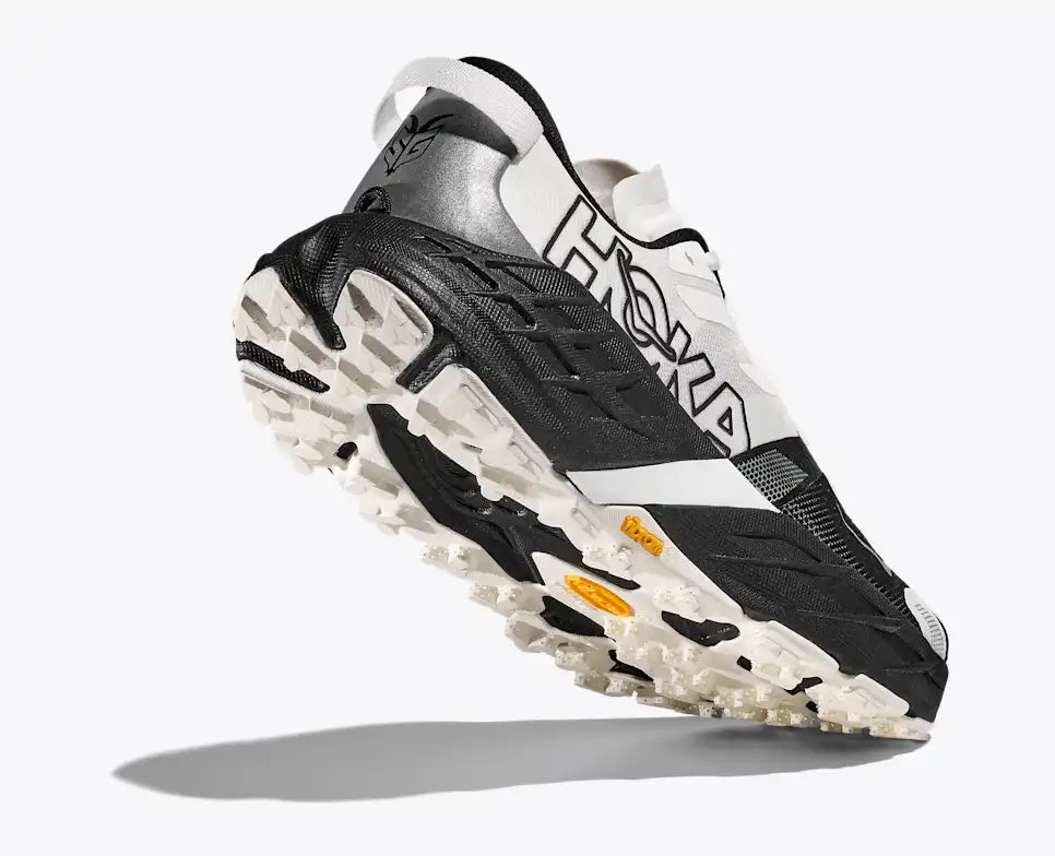 back view of hoka speedgoat 7 trail runners for men in black, white colour