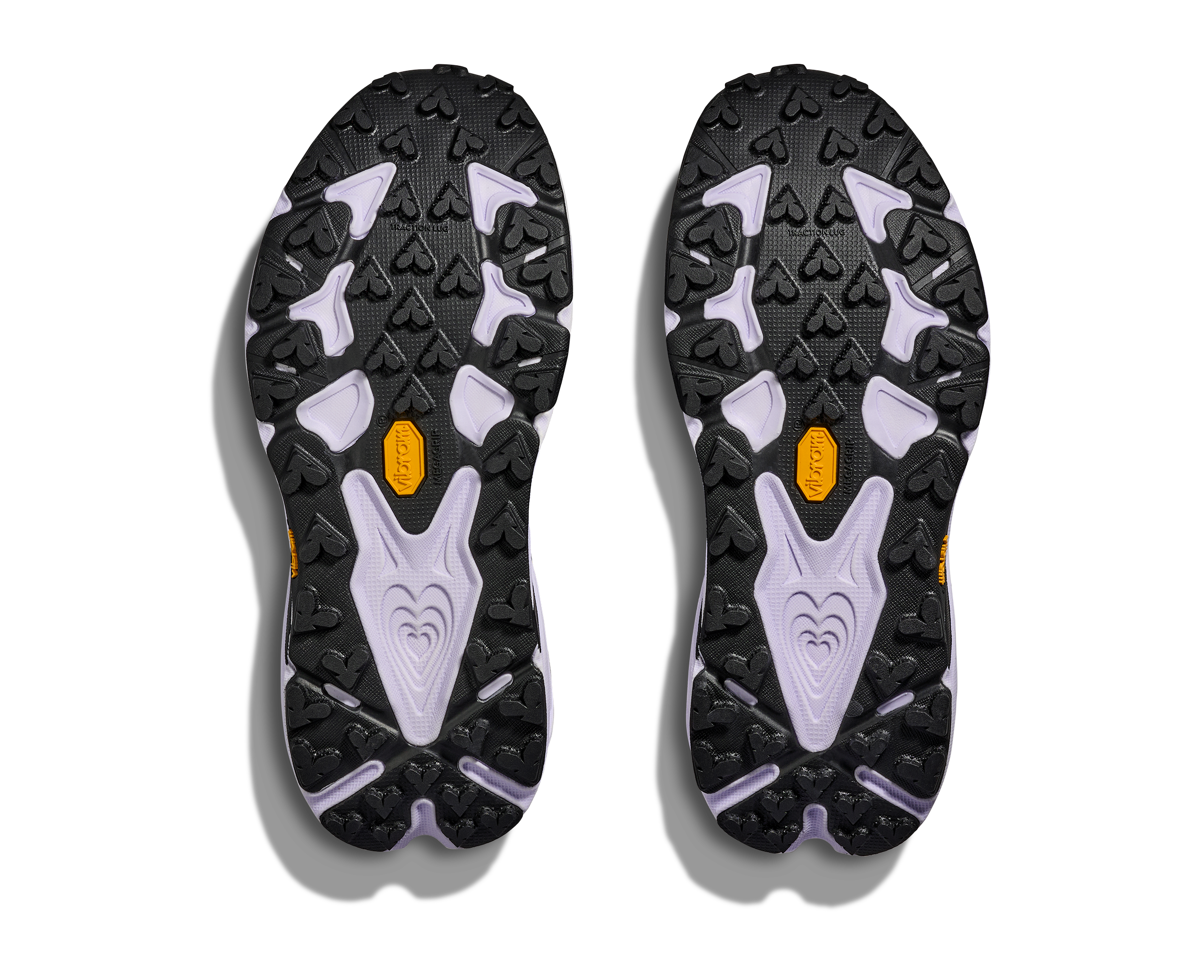 pair of hoka speedgoat 7 trail runner for women in berry jam and starlight glow colour, showing vibram grip sole and lugs