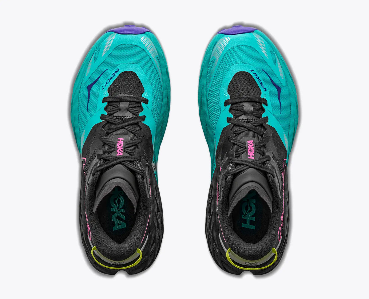 hoka speedgoat trail running shoe for women, technical trail runner, teal black colour with pink details, top down view of shoes