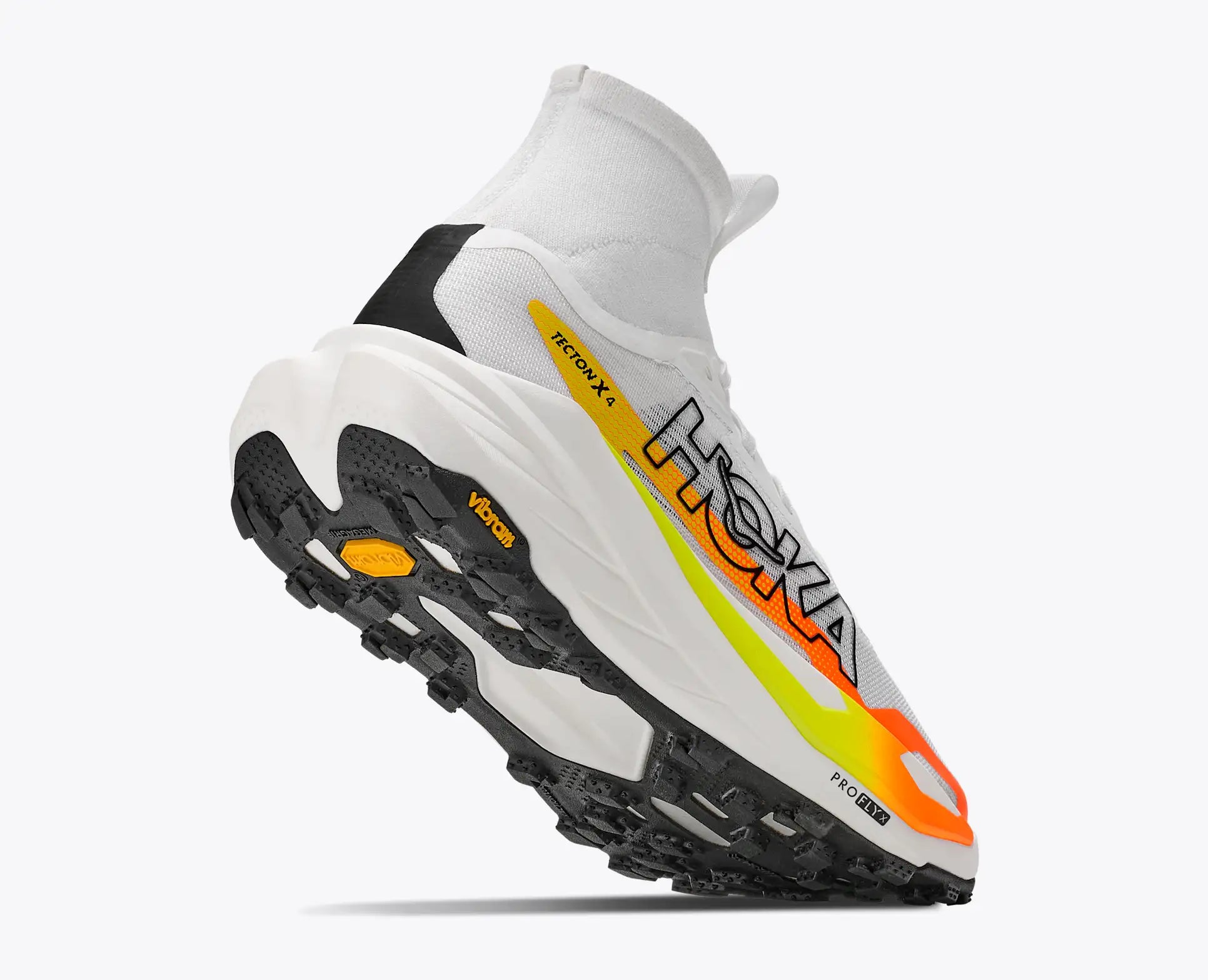 hoka tecton x 4 mens, carbon plated trail running and racing shoe, white with yellow and orange details, liifted heel of shoe