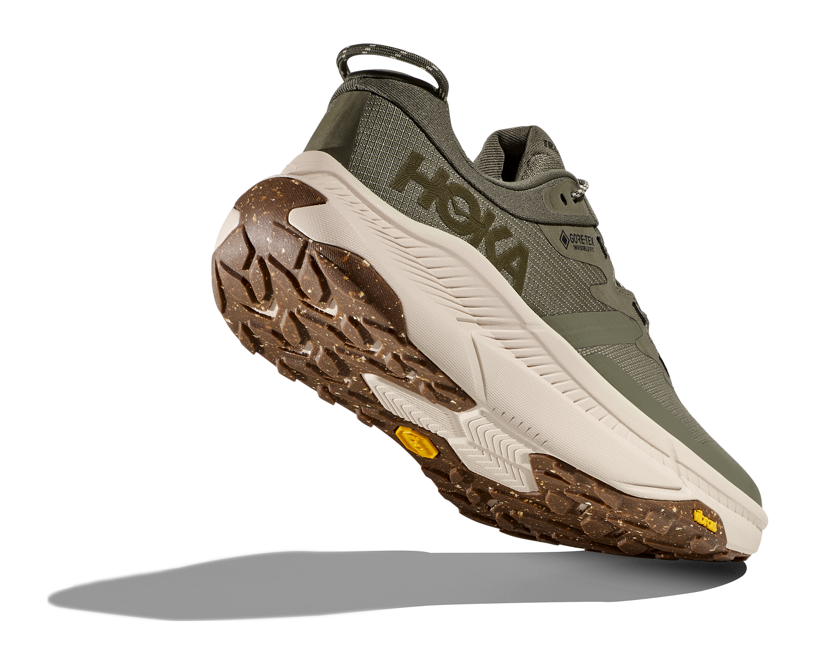 Dark green hoka hiking shoe with cream and brown sole
