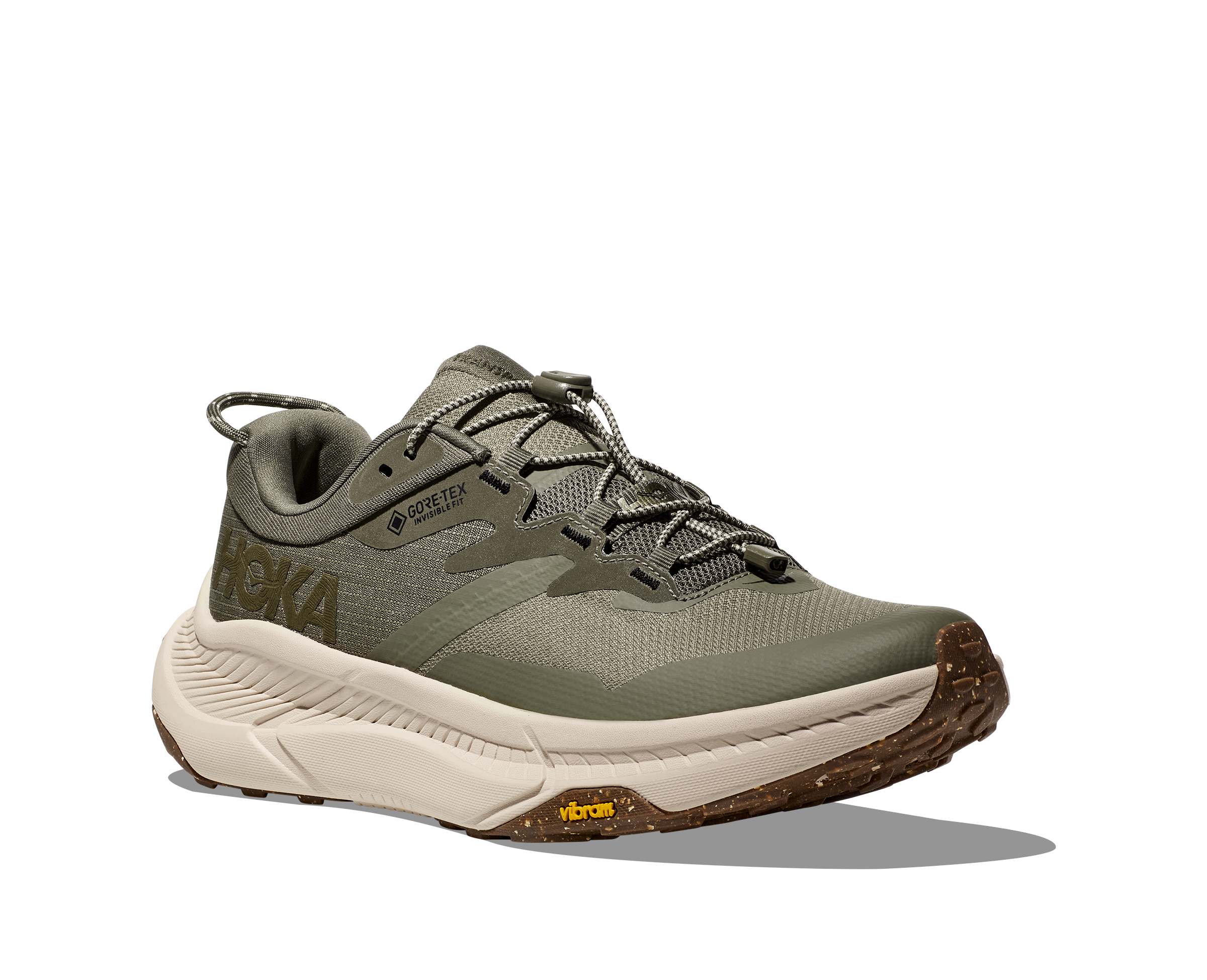 Dark green hoka hiking shoe with cream sole and HOKA logo front toe