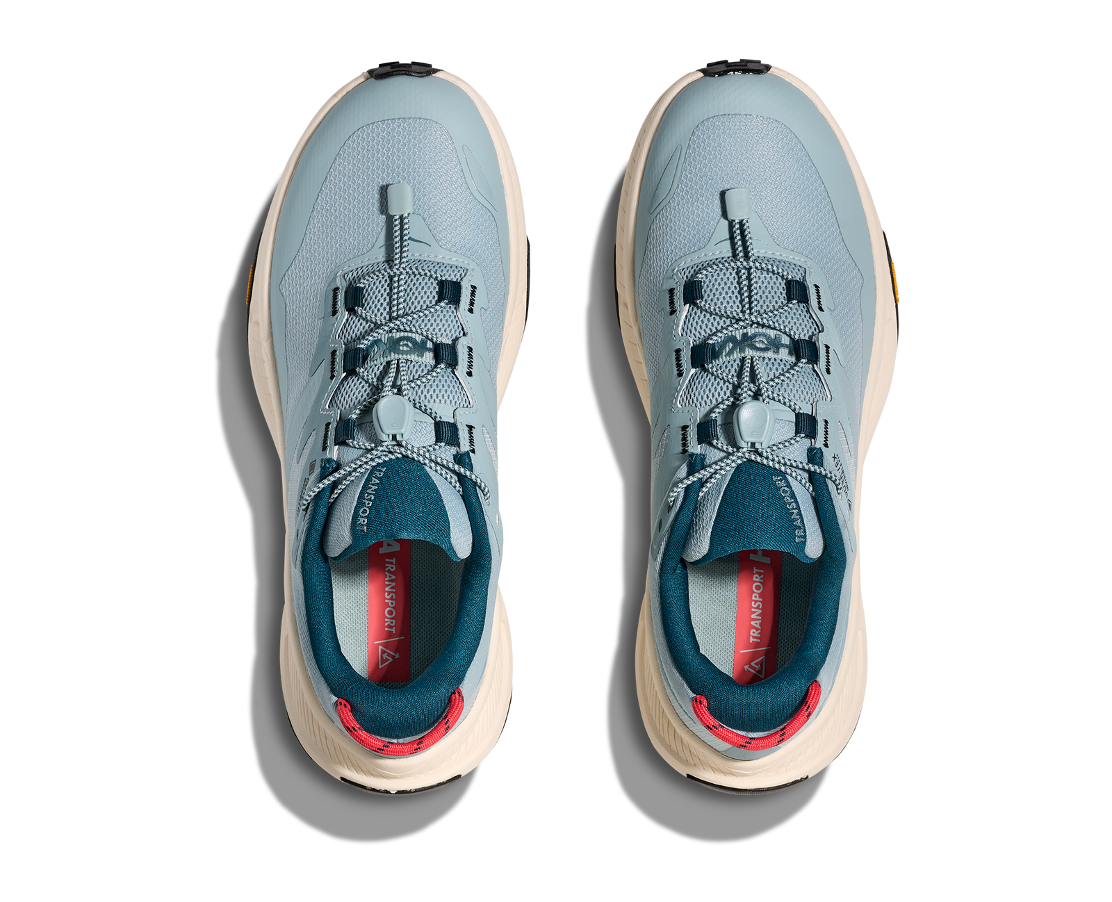 Light blue hoka hiking trail shoe for women with cream sole and red details overview