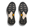 Close-up of a pair of black and beige shoe soles