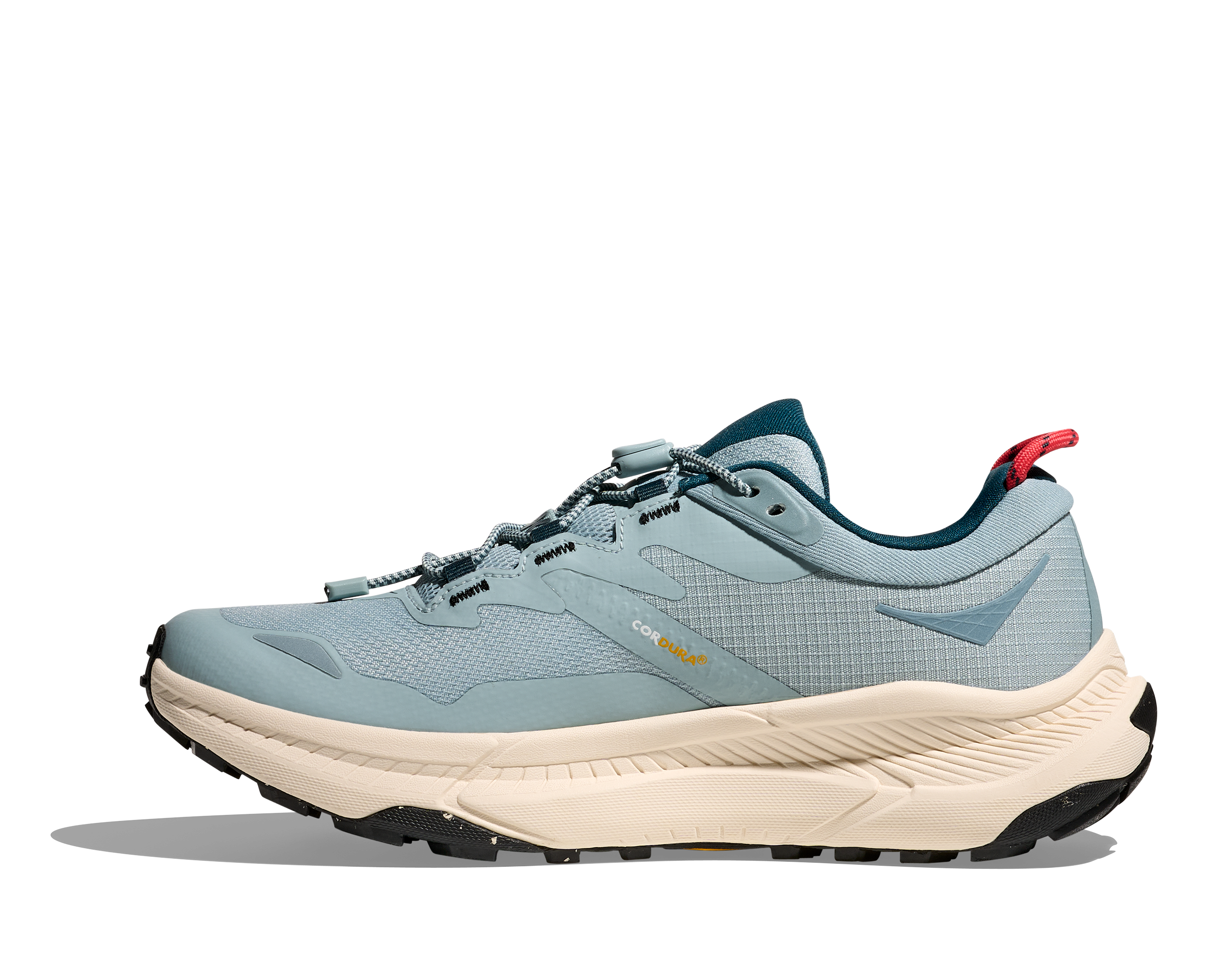 Light blue hoka hiking trail shoe for women with cream sole and red details inside