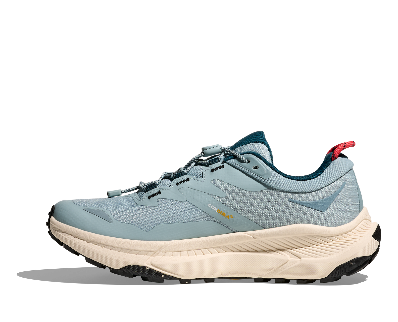Light blue hoka hiking trail shoe for women with cream sole and red details inside