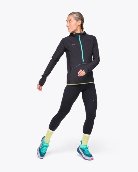 Hoka Skyglow Half Zip for Women full action model