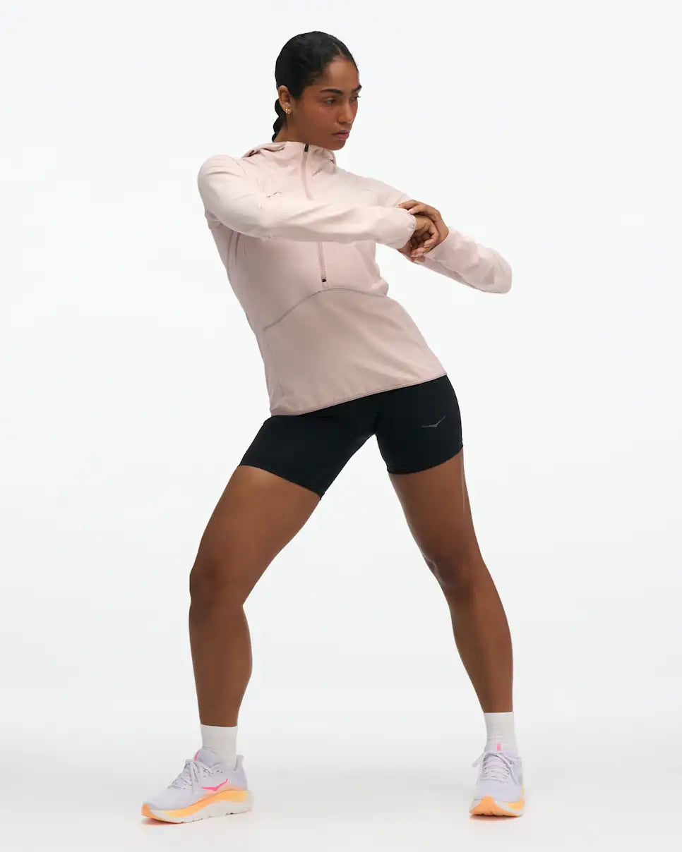 hoka womens skyglow half zip running top, short zip water resistant stretchy hooded top, front view of top in a pink colour