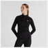 Woman wearing a black New Balance long-sleeve athletic top 