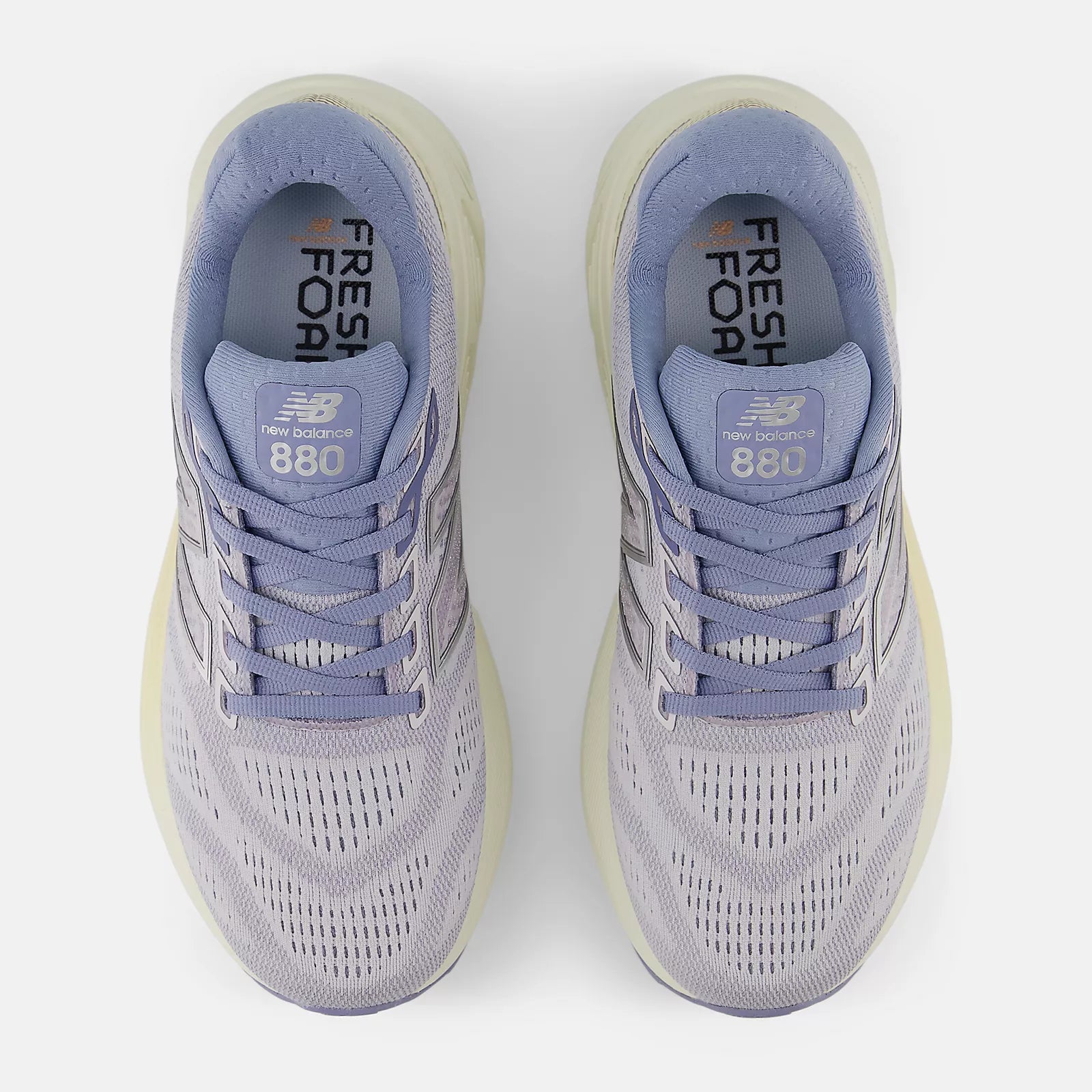 nb 880v15 for women, cushioned neutral running shoe, light purple with white and cream sole, overview of top of shoe