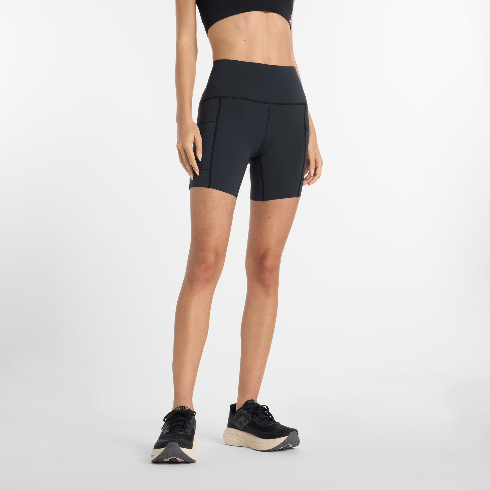 Woman wearing nb high rise running shorts, 6