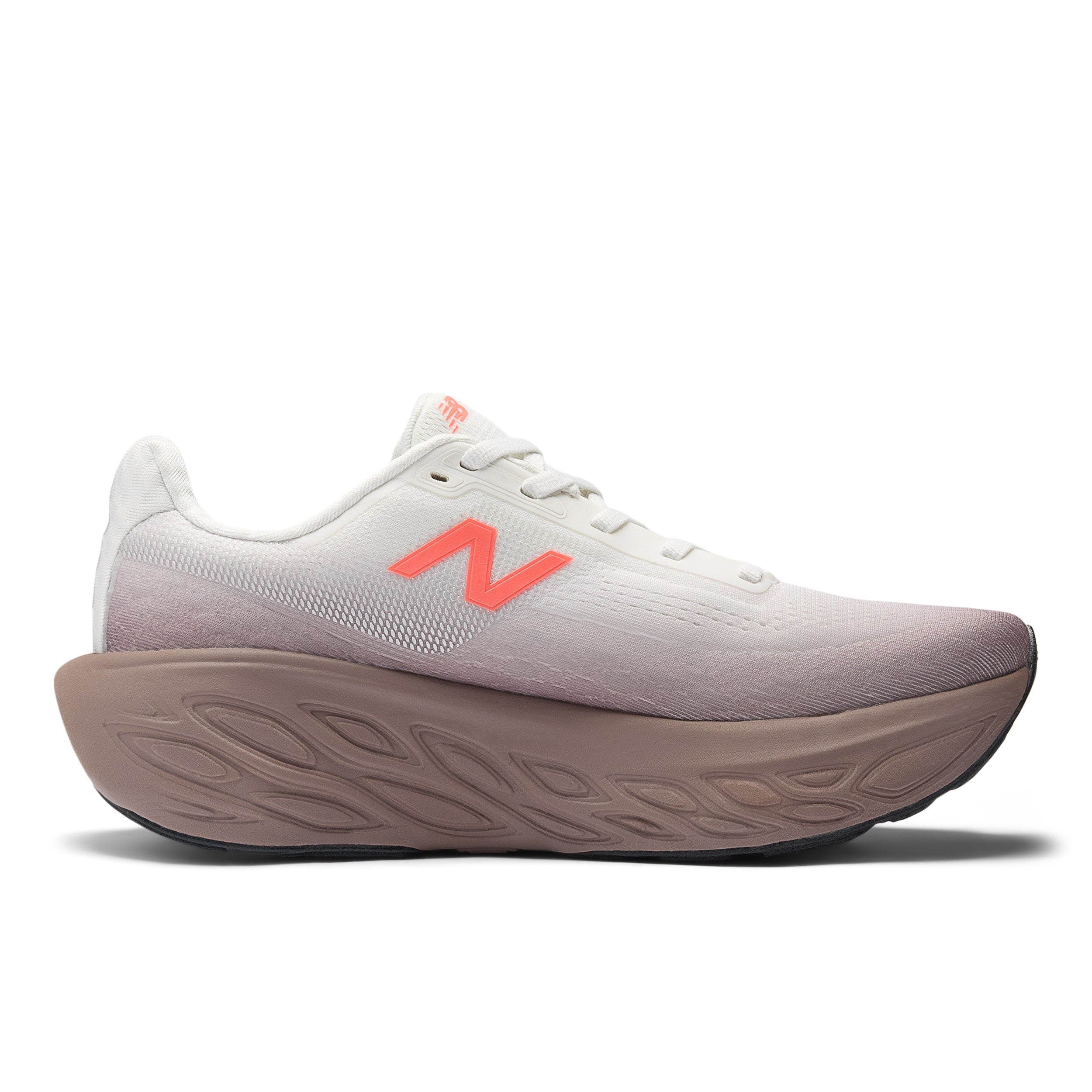 new balance 1080 for women brown and white cushioned running shoe with orange accent "N"