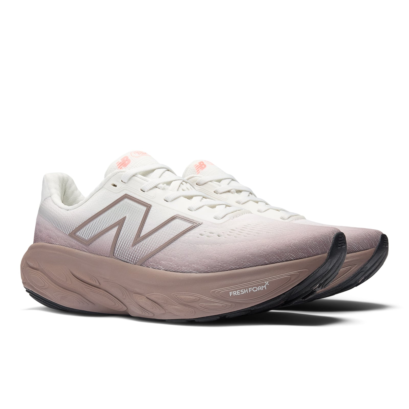 new balance 1080 for women brown and white cushioned running shoe with orange and pink accents
