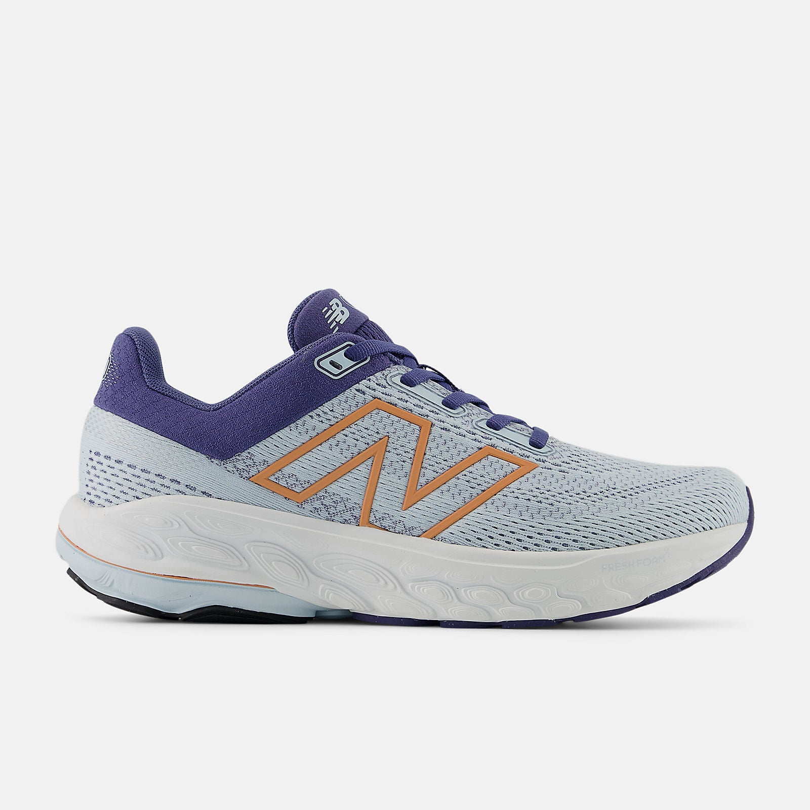 Light blue new balance 860v14 running shoe with purple accents