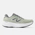 light green new balance running shoe with grey New Balance logo and details