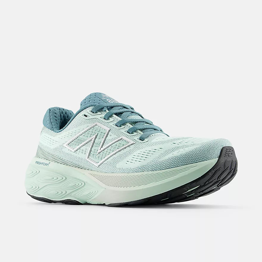 nb 880v15 for women, cushioned neutral running shoe, light cyan upper and sole, front side profile