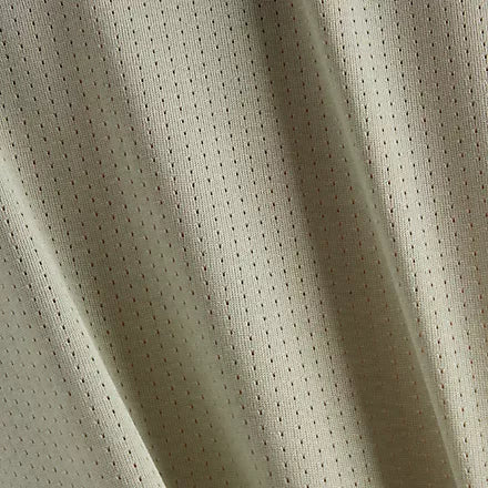new balance athletics long sleeve, long sleeve breathable layering shirt, light green colour, close up of material