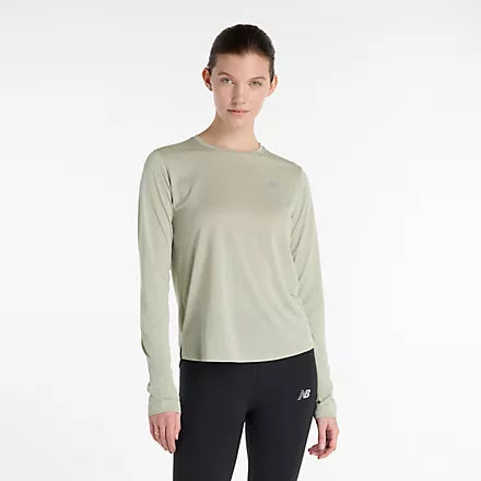 new balance athletics long sleeve, long sleeve breathable layering shirt, light green colour, woman wearing long sleeve new balance shirt with black leggings