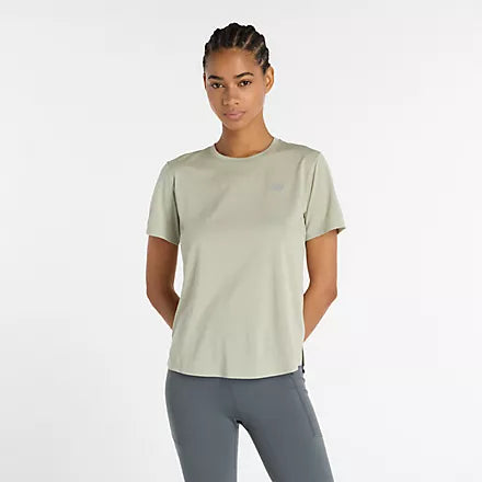 new balance short sleeve shirt for women, lightweight breathable tshirt, light green colour, model wearing shirt and light grey leggings