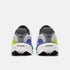 new balance fresh foam 1080v15 soft bouncy lightweight road running shoe for men, light grey with blue and green accents, back profile of shoe on a white background
