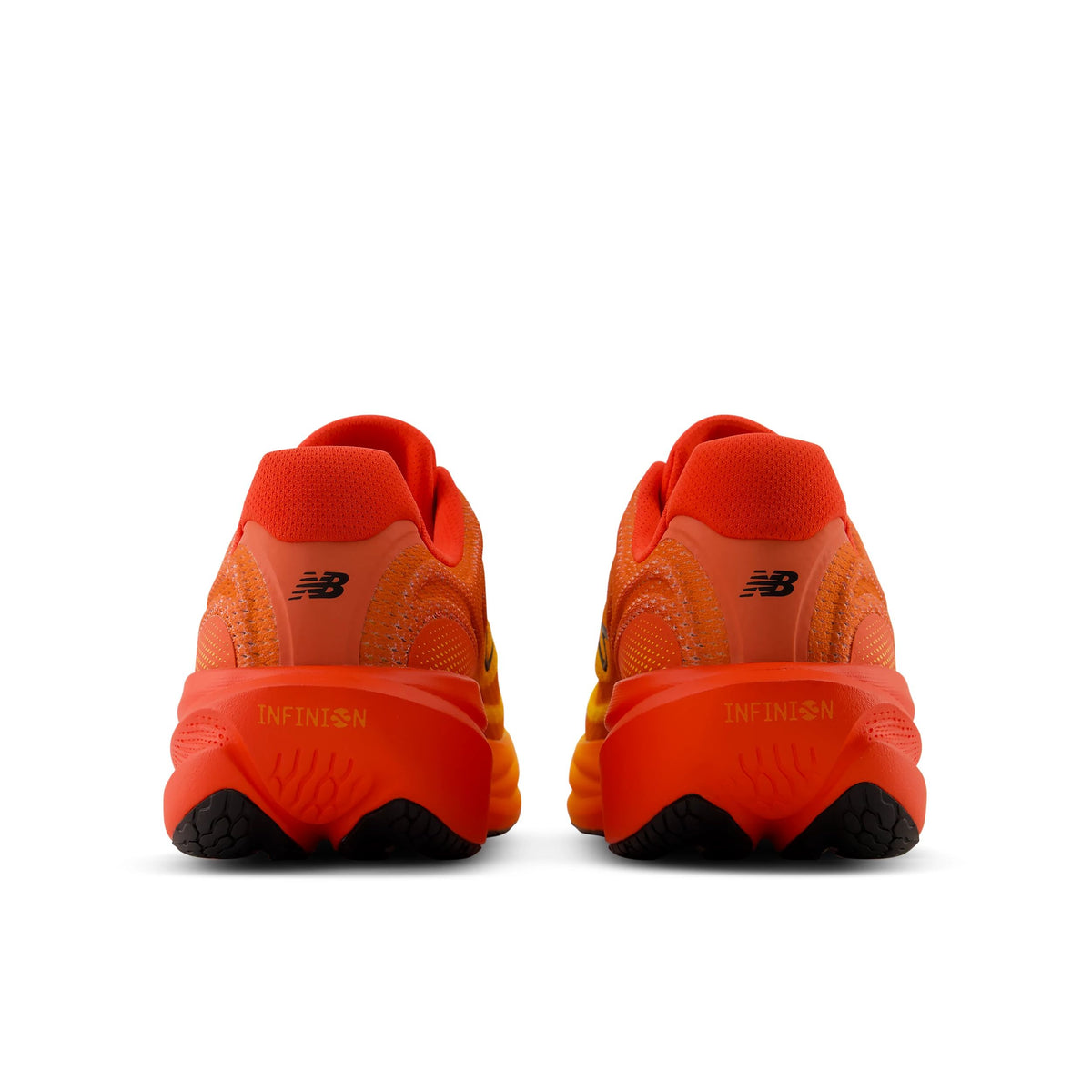 new balance fresh foam 1080v15, soft bouncy lightweight road running shoe for men, bright orange colour with yellow accents, back profile of both shoes on a white background