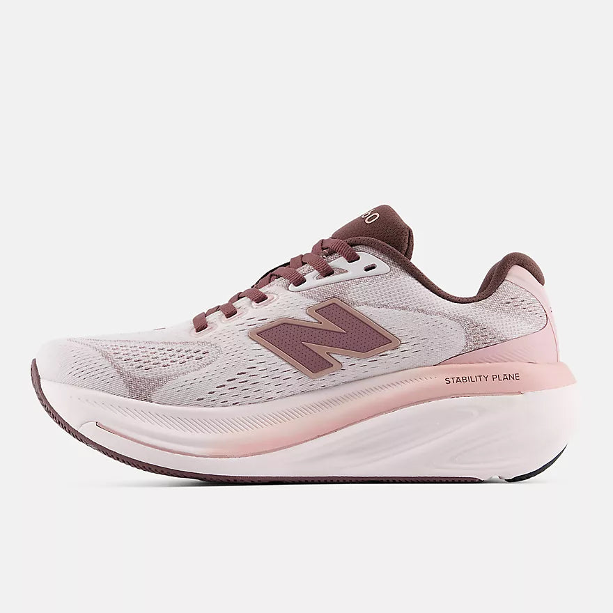new balance fresh foam 860v15 comfortable lightweight supportive stability road running shoe for women, light pinnk with purple accents, profile of shoe on a white background