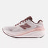 new balance fresh foam 860v15 comfortable lightweight supportive stability road running shoe for women, light pinnk with purple accents, profile of shoe on a white background