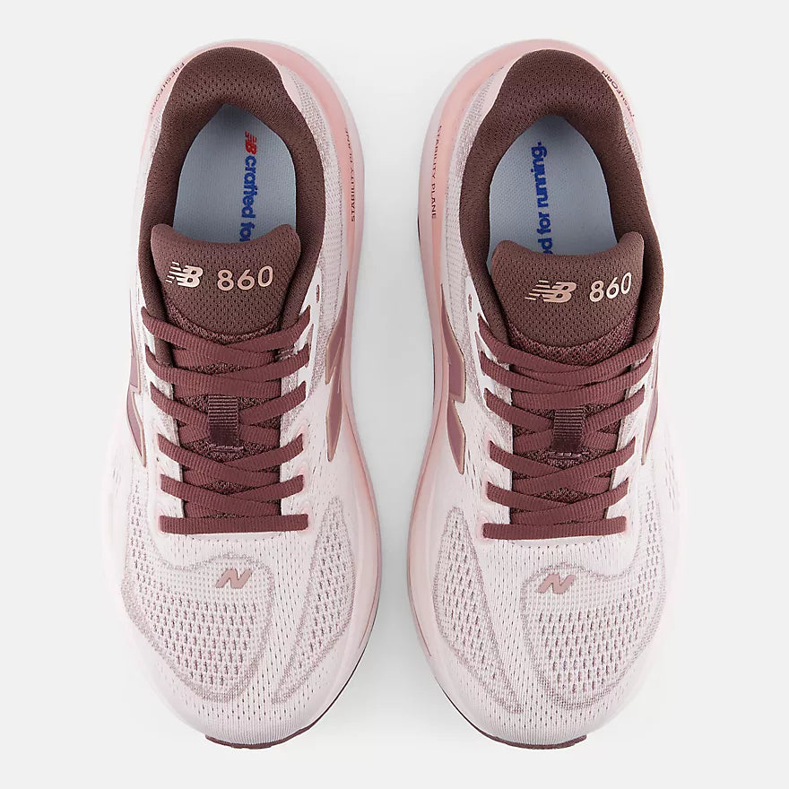 new balance fresh foam 860v15 comfortable lightweight supportive stability road running shoe for women, light pinnk with purple accents, overhead profile of both shoes on a white background