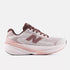 new balance fresh foam 860v15 comfortable lightweight supportive stability road running shoe for women, light pinnk with purple accents, profile of shoe on a white background